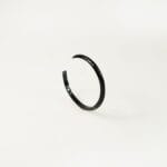 Versatile black-plated silver Conical cuff bracelet, perfect for elevating any modern men's fashion statement.